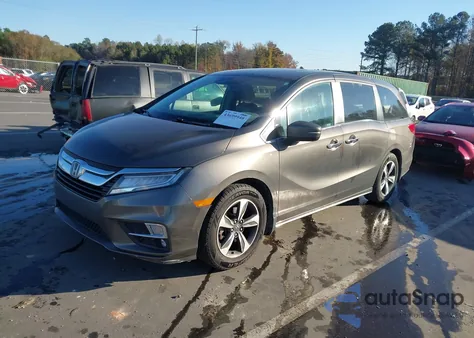 2018 Honda Odyssey Touring z USA, uszkodzony, nr VIN 5FNRL6H85JB076120